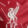 1c26a77e Liverpool FC home jersey for the 2026/27 season, The shirt brings a heavily retro-inspired look, reviving the iconic geometric patterns worn by the club between 1989 and 1991 during the legendary "Candy era"