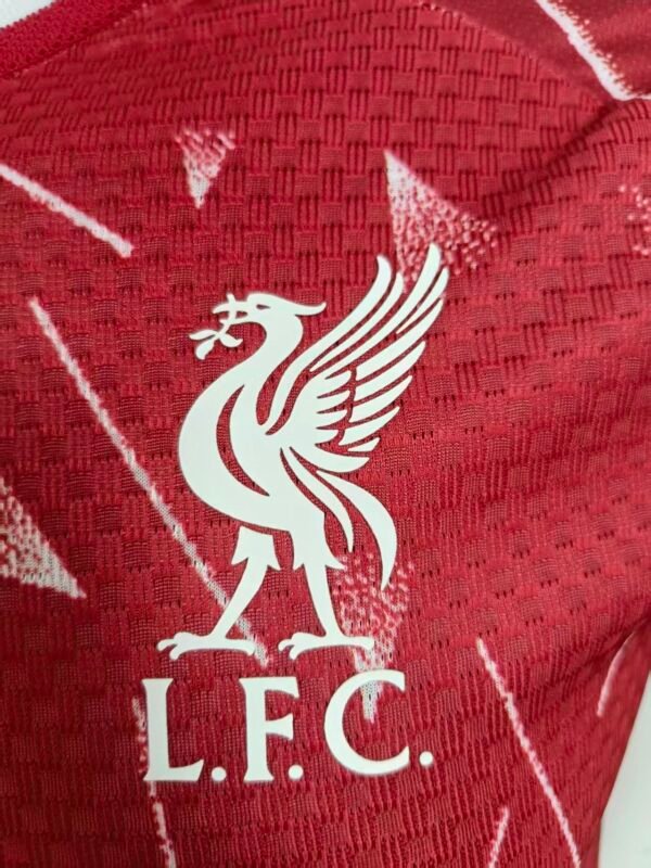 1c26a77e Liverpool FC home jersey for the 2026/27 season, The shirt brings a heavily retro-inspired look, reviving the iconic geometric patterns worn by the club between 1989 and 1991 during the legendary "Candy era"