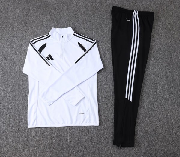 2885ee92 Adidas Tiro 26 League 1/4-Zip Training Tracksuit Set in black and white.