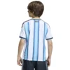 C4-1168652-636Wx636H Argentina 3-Star Home Jersey tailored in youth and kids' sizes. This classic kit features the iconic light blue and white stripes accented with gold branding, the official AFA crest, and three stars celebrating their historic World Cup victories.