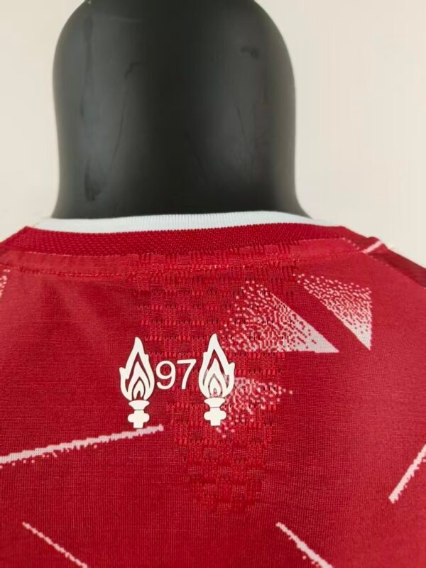 b3bfb4ca Liverpool FC home jersey for the 2026/27 season, The shirt brings a heavily retro-inspired look, reviving the iconic geometric patterns worn by the club between 1989 and 1991 during the legendary "Candy era"